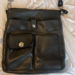 ROOTS black leather purse/bag